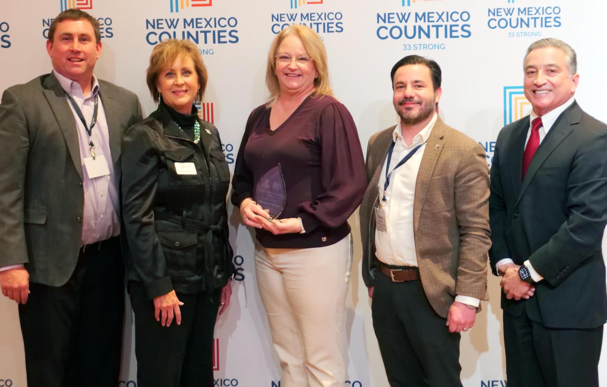 San Juan County Audit award- LtoR Mike Stark, Terri Fortner, Kim Martin, Steven Saavedra, State Auditor Joseph Maestas